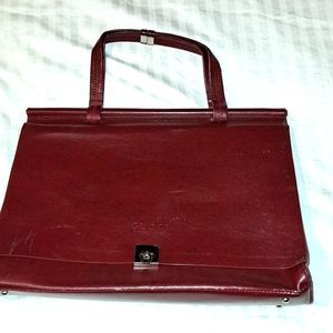 Gucci Burgundy Leather Tote used have some scratches.